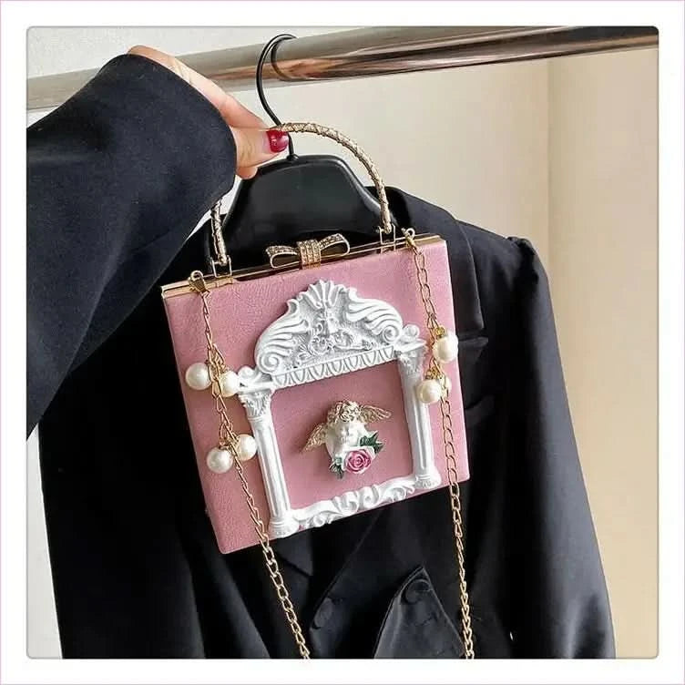 Ornate Black Shoulder Chain Bag with Cherub Detail - Pleasures and Sins