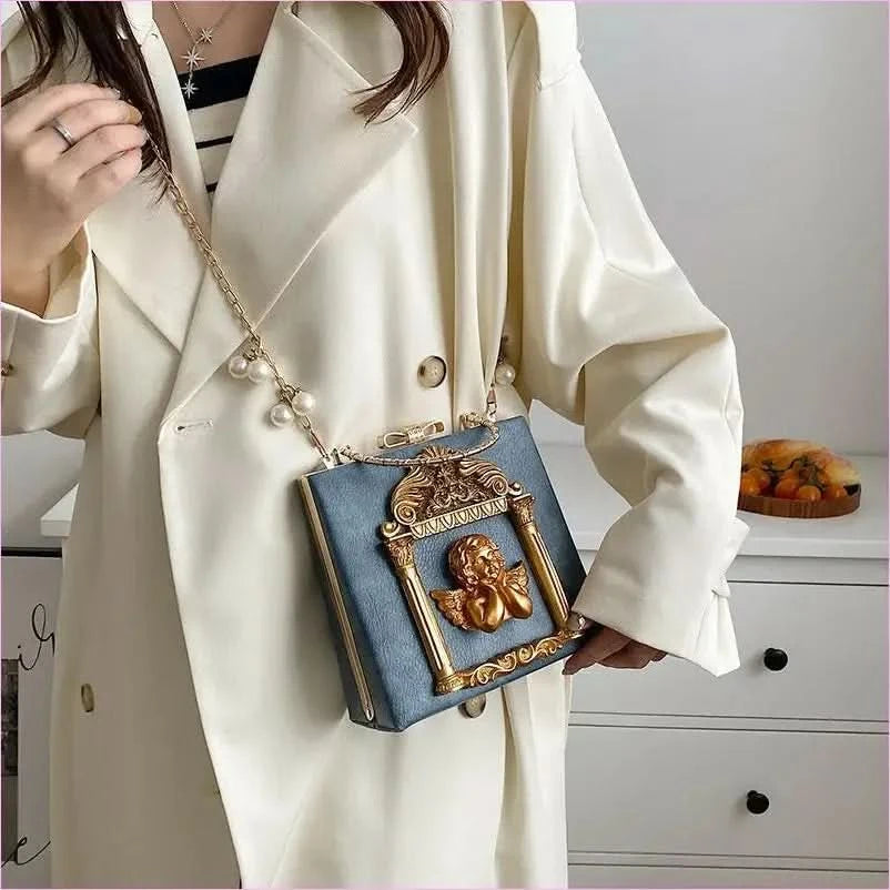 Ornate Black Shoulder Chain Bag with Cherub Detail - Pleasures and Sins