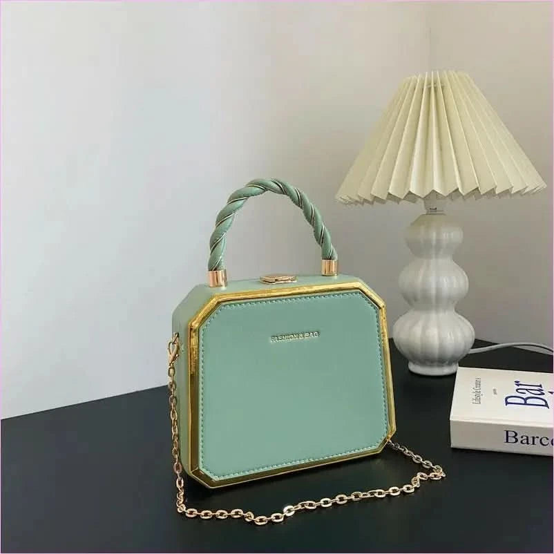 Chic Chain Crossbody Green Handbag with Twisted Handle and Gold Trim - Pleasures and Sins