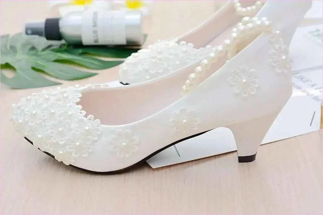 Chic White Bridesmaid Shoes with Pearl Straps and Floral Details - Pleasures and Sins