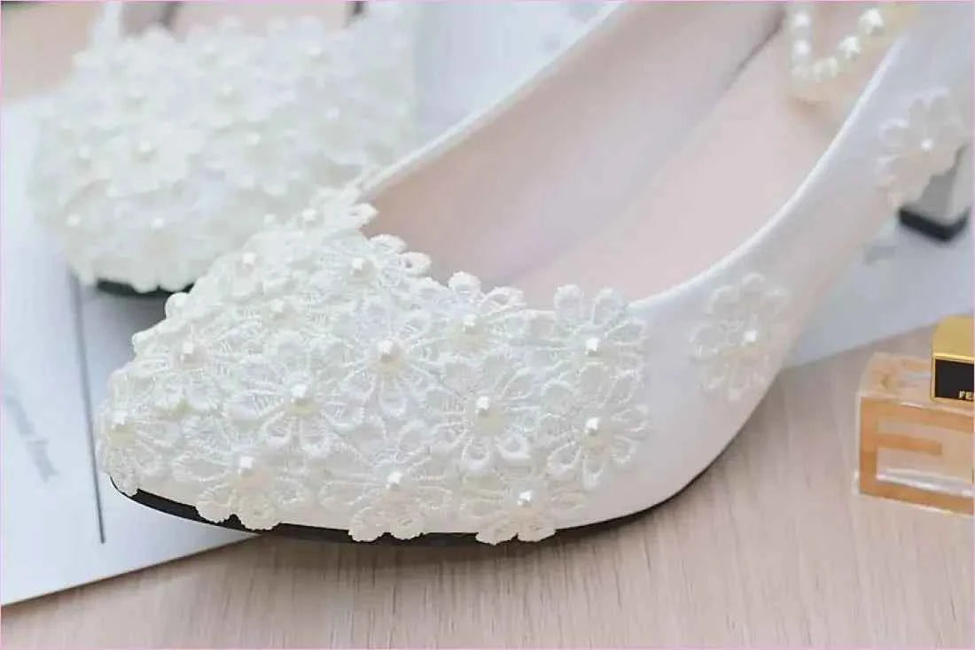 Chic White Bridesmaid Shoes with Pearl Straps and Floral Details - Pleasures and Sins