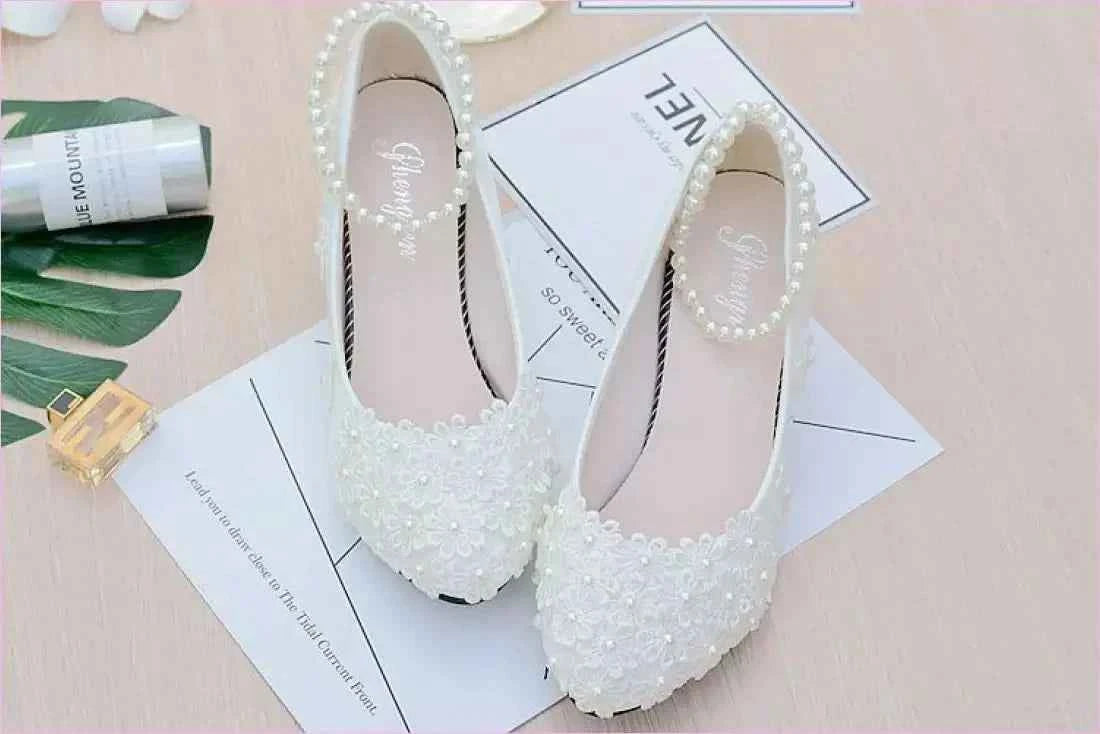 Chic White Bridesmaid Shoes with Pearl Straps and Floral Details - Pleasures and Sins