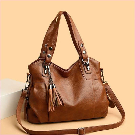 Classic Faux Leather Large Handbag with Sheepskin Tassel and Boho Flair - Pleasures and Sins