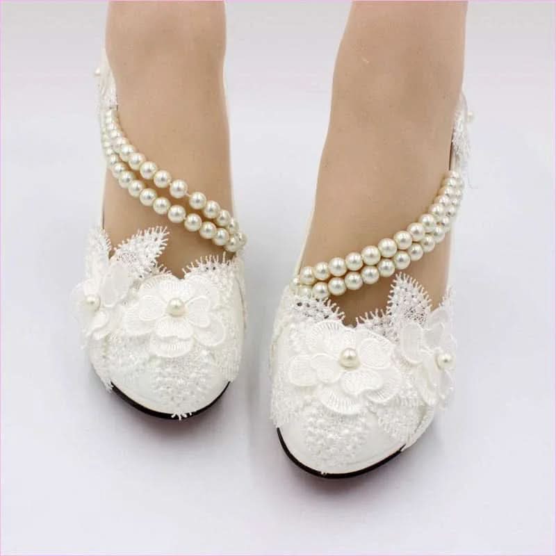Elegant White Wedding Shoes with Pearl Strap and High Heel Style - Pleasures and Sins
