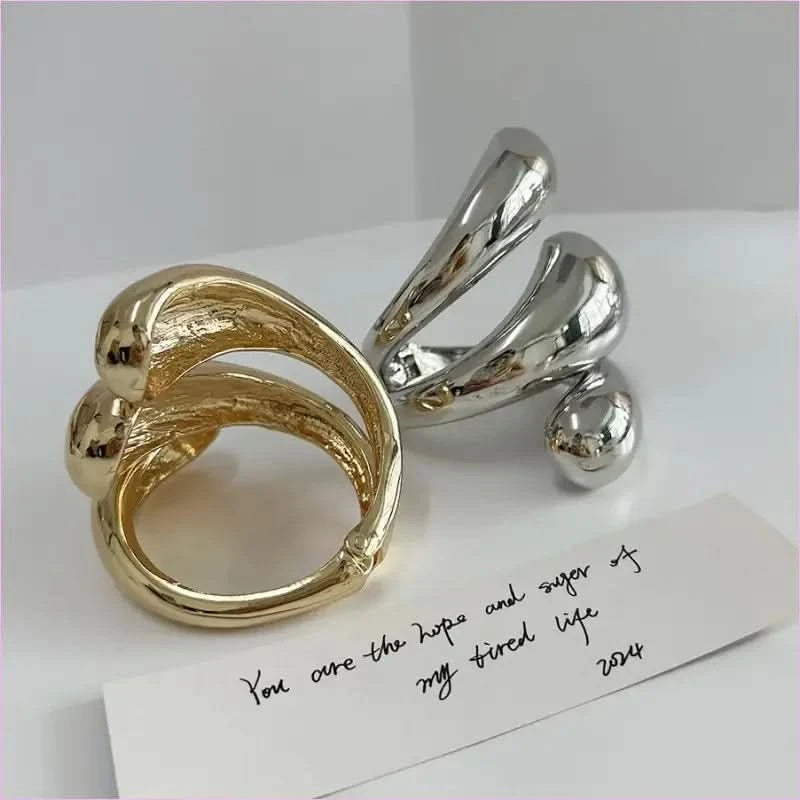 Geometric Spiral Water Droplet Opening Bracelet in Gold Tone - Pleasures and Sins