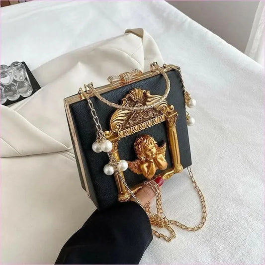 Ornate Black Shoulder Chain Bag with Cherub Detail - Pleasures and Sins