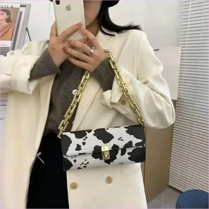 Zebra-print Animal Prints Underarm Handbag with Chain Strap - Pleasures and Sins